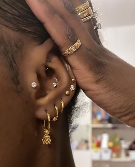 Angela Nakiyingi Ear piercing stack 😍 Beyonce Ear Piercing, Small Ear Stretch, Decorated Ears Piercings, Christina Piercing Placement, Pierced Ears Ideas, Best Ear Piercings, Ear Scape Ideas, Industrial Piercing Aesthetic, Ear Setup