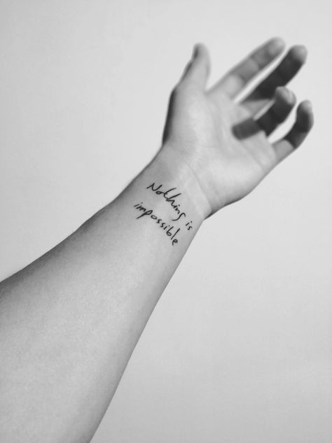 Nothing is impossible #tattoo #minimalism #quote Nothing Is Impossible Tattoo, Impossible Tattoo, Positivity Tattoo, Quote Tattoos, Sister Tattoo, Daughter Tattoos, Nothing Is Impossible, Arm Band Tattoo, Mother Daughter Tattoos