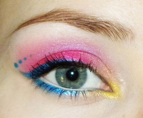 Fresh and simple with funky pink, blue and yellow eyeshadows. Description from makeupstyleideas.com. I searched for this on bing.com/images 80's Makeup, Rosa Make-up, Fantasy Make-up, Yellow Makeup, Trendy Eyeshadow, Yellow Eyeshadow, 80s Makeup, Hair Glitter, Awesome Makeup