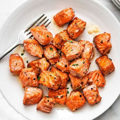 Air Fryer Salmon Bites (Lemon Garlic Butter) - Downshiftology Salmon Bites Air Fryer, Best Air Fryer Salmon, Easy Salmon Dinner, Salmon Bites Recipe, Lemon Garlic Butter Sauce, Air Fryer Salmon, Salmon Bites, Best Air Fryer, Air Fryer Dinner Recipes