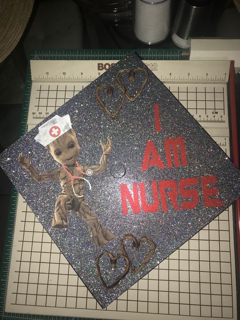 Nurse Graduation cap inspired by baby groot 🎓❤️ Groot Graduation Cap, Nursing Grad Cap Ideas Funny, Funny Nurse Graduation Cap, Oncology Nurse Graduation Cap, Operating Room Nurse Graduation Cap, Healthcare Management Graduation Cap, Graduation Cap Designs Nursing, Disney Nursing Graduation Cap, Funny Nurse Grad Caps