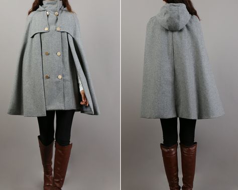 * A cool and long wool cape coat with hood, very elegant. * With double row gold color buttons and two pockets, fully lined. * If you want black or silver buttons, please let us know, thanks. * Stand up collar, more warmer. * Material: out shell - 50% wool, 50% polyester; lining - 100% polyester * Care: dry cleanable * Shop sizing chart FYI ( made according to US sizing. actual body figures, not laying flat clothes measurements) Size XS (US 2, UK 6, German 32, French 34, ) Bust: fits bust around Cool Winter Coats, Winter Clothes Design, Cloak Designs, German Clothes, Fantasy Coat, High Neck Coat, Mantel Cape, Wool Cloak, Poncho Fashion