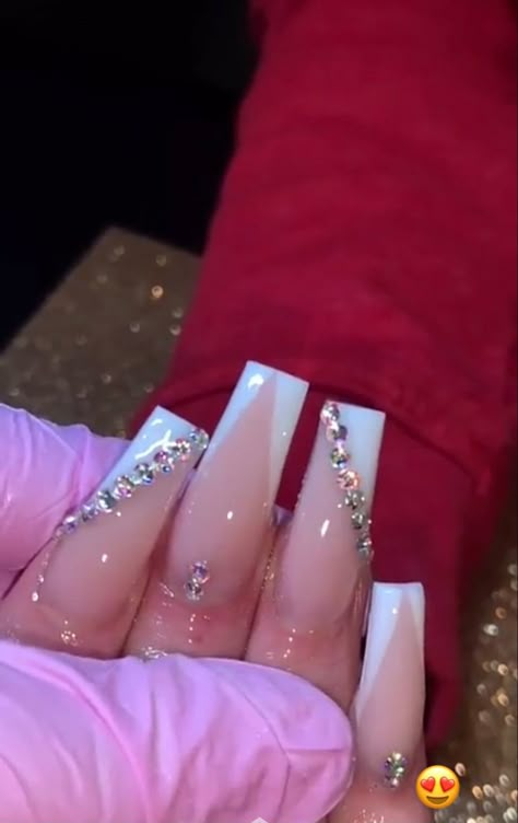 Plain White Acrylic Nails With Gems, White 18th Birthday Nails, White Long Nails With Gems, Nail Designs Diamonds Rhinestones, V Shaped French Tip Nails With Gems, Long Pink Acrylic Nails With Rhinestones, White And Rhinestone Nails, White Tip Nails With Diamonds, Prom Nails Diamonds