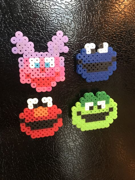 Abby, Cookie Monster, Elmo and Oscar perler bead magnets Alpha Patterns Perler Beads, Tiny Perler Bead Patterns Food, Elmo Perler Beads, Fuse Bead Patterns Small And Easy, Perler Bead Magnets, Melt Beads Patterns, Easy Perler Bead Patterns, Melty Bead Patterns, Pearl Beads Pattern