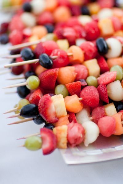 The perfect party food should have great presentation, be easy to eat and, of course, taste delicious! We’ve found that if it’s bite-size or served on a stick, it’ll likely be a crowd-pleaser, and bonus points go to anything covered in rainbow sprinkles. Get inspired by 25 of our favorite ideas for party foods, including […] Summer Wedding Food, Bridal Shower Menu, Summer Wedding Diy, Graduation Party Foods, Wedding Appetizers, Wedding Themes Summer, Fruit Skewers, Summer Bridal Showers, Fruit Kabobs