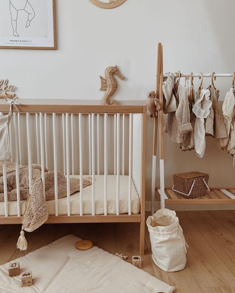 Our lovely wooden clothes rack will inspire your child to tidy up their belongings! With its white beech color scheme, the mini wardrobe perfectly matches our Mini bed 🫶 - #wearemokee #kidsinteriors #wardrobe #babyclothes #nurseryfurniture #kidsfurniture #babybrand #ukmums #nurserydecor #nurseryinspo #babyroom #kidsroom Mini Bed, Wooden Clothes Rack, Moses Basket Bedding, Toddler Cot, Mini Wardrobe, Cot Bed Mattress, Wood Nursery, Kids' Furniture, Natural Mattress