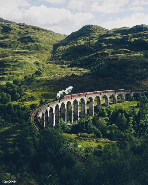 Glenfinnan Viaduct railway in Inverness-shire, Scotland | premium image by rawpixel.com Hogwarts Poster, Scotland Aesthetic, Diablo Lake, Harry Potter Wall, Breathtaking Nature, Train Posters, Buku Harry Potter, Batman Poster, Images Harry Potter