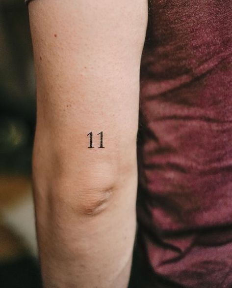 Atelier L. Rosie on Instagram: ""11"⁠ ⁠ ⁠ ⁠ #lettering #tattoo #letterintattoo #schorndorf #aterlierlrosie #lrosie #stuttgart #tattoo #fineline" Eleven Tattoo Number, Eleven Tattoo, Tattoo Above Knee, 11 11 Tattoo, 11 Tattoo, Tattoo Number, Lettering Tattoo, Above Knee, 11 11