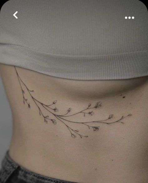 Tattoo Ideas Female Belly, Floral Tattoo Ribcage, Sternum Vine Tattoo, Below Breast Tattoo, Baby S Breath Tattoo, Vine Ribcage Tattoo, Fine Line Underboob Tattoo, Upper Abdomen Tattoo, Vine Sternum Tattoo