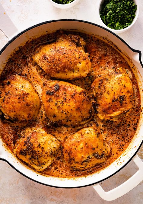 Easy Baked Chicken Thighs in Creamy Sauce Recipe Chicken Thighs In Dutch Oven, Dutch Oven Chicken Thighs, Oven Chicken Thighs, Easy Baked Chicken Thighs, Dutch Oven Chicken, Oven Baked Chicken Thighs, Chicken Thigh Recipes Baked, Easy Baked Chicken, Oven Chicken