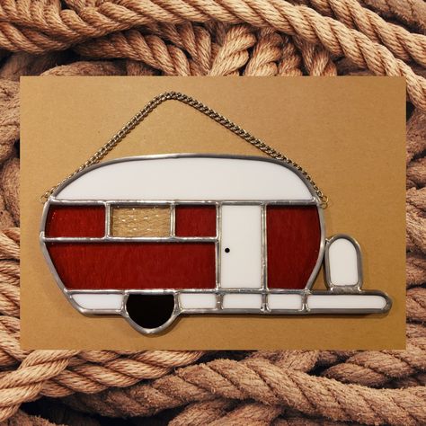 "Are you a camping enthusiast? Is someone you know hooked on camping?  This red stained glass camper will bring a smile to your face as you enjoy past summer memories.  It will certainly be the basis of conversation when you hang one in your camper window while in the campground (remove from window for travel) and in the off-season hang in your window at home, reminding you of the fun times to come when it's camping time again! Red not your color?  Check our other listings for your favorite colo Aristocrat Trailer, Camper Windows, Stained Glass Patterns Free, Triangle Art, Flower Panels, Camping Lovers, Camper Decor, Red Stain, Stained Glass Crafts