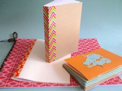 Making and binding a homemade book is likely easier than you think. You can make journals and notebooks to give as gifts, bind a collection of artwork or writing and make programs -- all from materials you might already have at home. Here are some techniques.Spray Glue & Tape Binding:This technique works best with many small same-sized pages.... Homemade Journal, Homemade Books, Mini Video, Bookbinding Tutorial, Book Binding Diy, Diy Notebook, Diy Journal, Handmade Books, Book Projects