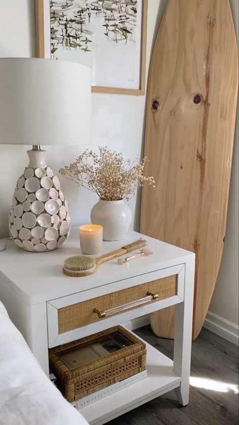 White nightstand with rattan single drawer west elm with flower vase decor and self care Nightstand Decor Bedroom, Cute Nightstand, Aesthetic Nightstand, Nightstand Aesthetic, Rattan Nightstand, Bedroom Coastal, Bedroom Decor For Small Rooms, Nightstand Decor, Coastal Bedroom