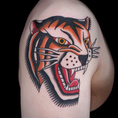 Tiger Tattoo by Jimmy Snaz Jimmy Snaz, Simple Lion Tattoo, Traditional Lion Tattoo, Traditional Sailor Tattoos, Traditional Tiger Tattoo, Female Lion Tattoo, Tiger Head Tattoo, Geometric Lion Tattoo, Tattoo Tiger