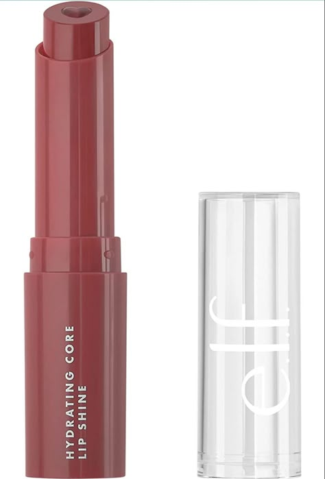 The e.l.f. Hydrating Core Lip Shine is a 2-in-1 melting lip balm combining an outer shell with a hint of color and an inner heart shaped core packed with skincare benefits. Infused with vitamin E to give your lips the nourishment they’ve been looking for. Its hydrating core will sure make your heart skip a beat! Why e.l.f. loves: • Heart shaped core infused with moisturizing Vitamin E • Adds a sheer tint of color and soft shine • Nourishes and conditions lips Key Ingredients: • Vitamin E - hel Elf Lip Shine, Elf Lip Shine Ecstatic, Elf Hydrating Core Lip Shine Happy, Hydrating Core Lip Shine, Elf Core Lip Shine, Essence Heart Core Lip Balm, Back To School Makeup, Lip Exfoliator, Makeup Artist Tips