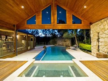 Indoor outdoor pool Freeform Pool Designs, Abandoned Mansion For Sale, Luxury Pools Indoor, Pools Design, Freeform Pools, Swimming Pool Photos, Indoor Outdoor Pool, Natural Swimming Pools, Pool Photos