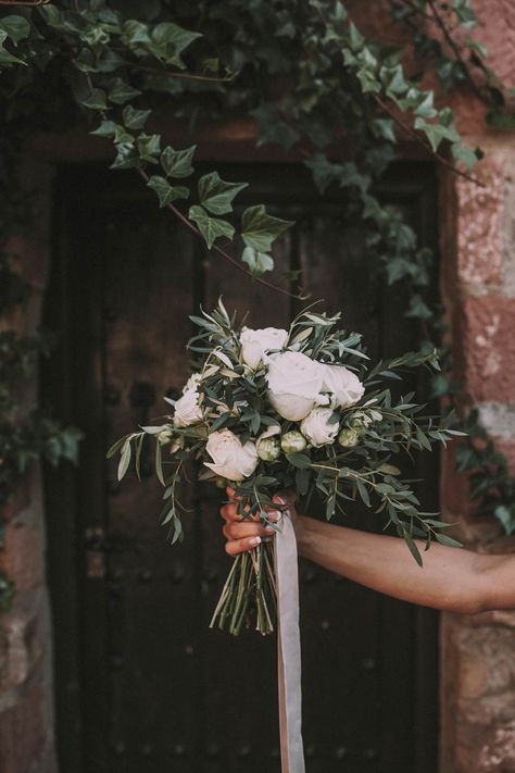 White Bridal Bouquet - Ernesto Villalba Photography | Elegant Outdoor Spanish Wedding with Olive Branches & White Flower Decor | Open The Door Events | Hacienda la Colora Venue White Flower Decor, White Rose Bridal Bouquet, Sicilian Wedding, Olive Branch Wedding, Olive Green Weddings, Olive Wedding, Rose Bridal Bouquet, Olive Leaves, Green Themed Wedding