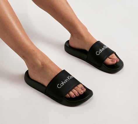 Calvin Klein Womens Linear Slide | Black | Footasylum Nike Crocs, Calvin Klein Slides, Sandals Nike, Calvin Klein Sandals, Summer Footwear, Slider Sandals, Hype Shoes, Cycling Women, Womens Vans