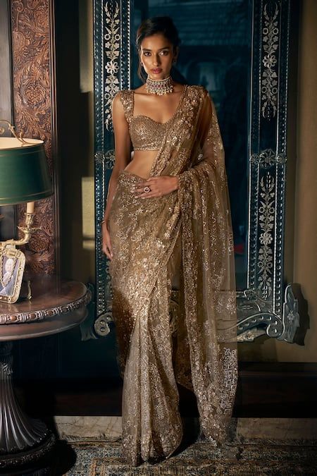 Buy Gold Net Embroidered Sequin Antique Tonal Saree With Blouse For Women by Seema Gujral Online at Aza Fashions. Modern Blouse Designs For Fancy Saree, Net Saree Look Modern, Modern Blouse Designs Saree, Modern Saree Party Wear, Gold Sequin Saree, Sequin Saree Party Wear, Saree Styles Modern, Sequin Saree, Sari Design