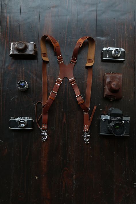 Handcrafted item, we spent around 7hrs to craft each camera harness. All items tested before shipping In this harness model we use an additional strap to enhance the straps area, so that your shoulders get less tention during shooting. Using two Camera Leather Strap will help you concentrate on the shooting process, free the neck and hands from constantly loading. Leather camera strap create an ideal and comfortable shape on the back, and the leather center part distributes the load evenly.  Camera harness is suitable for photographers of all levels, for all types of shooting: weddings, sports events, reportage shooting, etc. DSLR Camera Strap can be used with any mirror and mirrorless cameras, as we use universal screws. Dimensions of leather camera shoulder strap can be adjusted, and als Leather Camera Harness, Frozen Ocean, Camera Harness, Dslr Camera Straps, Leather Camera Strap, Center Part, Camera Straps, Camera Strap, Mirrorless Camera