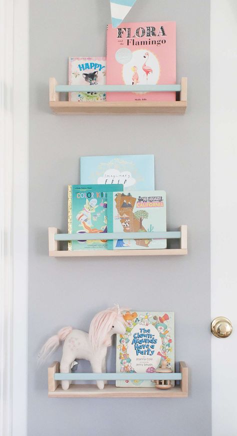 Ellie James’ Nursery Ikea Nursery Hack, Ikea Deco, Painted Bar, Nursery Hacks, Ikea Bekvam, Ikea Spice Rack, Ikea Nursery, Nursery Bookshelf, Baby Room Lighting