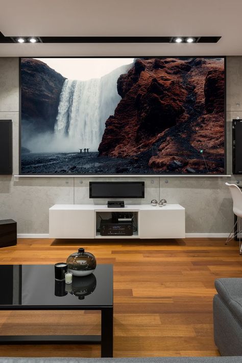 If you think your space is too small for you to set up the home theater of your dreams, think again. All you need is a wall, a projector screen, and a projector! Home Theater Screen, Home Theater Screens, Projector Screens, Home Theater Installation, Tv Unit Furniture Design, Tv Unit Furniture, Home Theater Decor, Home Theater Rooms, Theatre Room