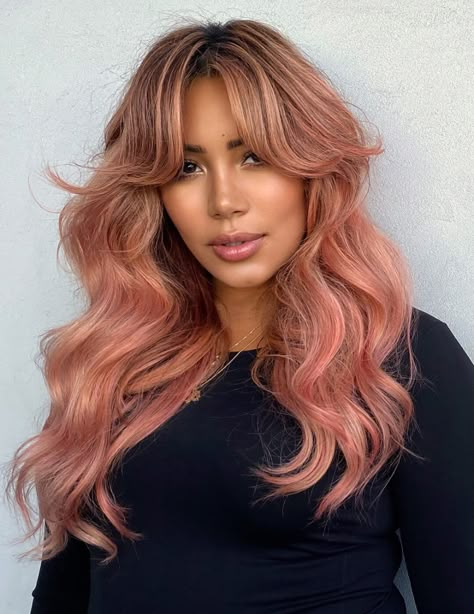 6 Best 70s Hair Trends to Try Now - 1970s Hairstyle Inspo | IPSY Shakira Pink Hair, Pink Hair On Latinas, Latina With Pink Hair, Pink Hair On Brown Skin, Hair Color For Brown Skin Latina, Dusty Rose Hair, Dusty Pink Hair, Baby Pink Hair, Disco Hair