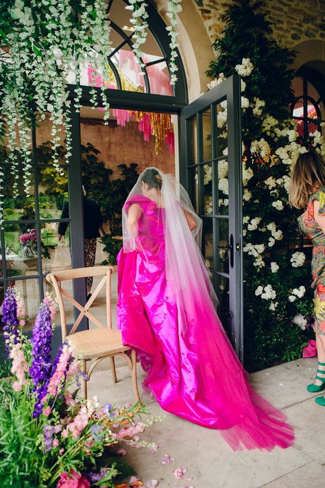 Bride in off the shoulder front ruching pink wedding dress with two layer white and pink ombre veil walking inside Middleton Lodge Hot Pink Wedding Dress The Bride, Vivienne Westwood Wedding Veil, Wedding Dresses Pink Tint, White Wedding Dress With Pink Tint, Dyed Wedding Dresses, Fuschia Wedding Dress, Pink Vail Weddings, Hot Pink Wedding Dress, Coloured Veil