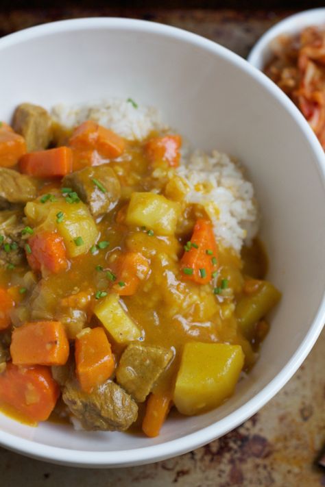 Korean Curry Rice! Filled with chunks of potatoes, carrots, beef and sweet potatoes, this hearty bowl of curry will hit the spot! #koreanfood #curry Korean Curry, Curry Rice Recipes, Mapo Tofu, Korean Cooking, Curry Rice, K Food, Korean Dishes, Weeknight Dinner Recipe, Asian Cooking