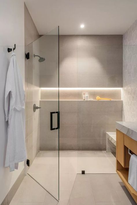 22 Shower Niche Ideas for Storing Your Stuff in Style Wet Room Shower Niche, Bathroom Niche Under Window, Lit Shower Niche, Bathroom Shampoo Niche, Wall To Wall Shower Niche, Shower Niche Placement With Tub, Floor To Ceiling Tile Bathroom, Large Shower Niche, Shower Lighting Ideas