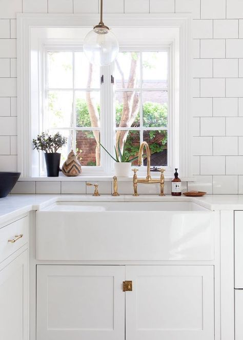 Kitchen Sink Window Decorating Ideas | Apartment Therapy Kitchen Sink Window, White Farmhouse Sink, White Shaker Cabinets, Grandma's House, Kitchen Farmhouse, Simple Kitchen, White Kitchen Cabinets, Trendy Kitchen, Kitchen Window