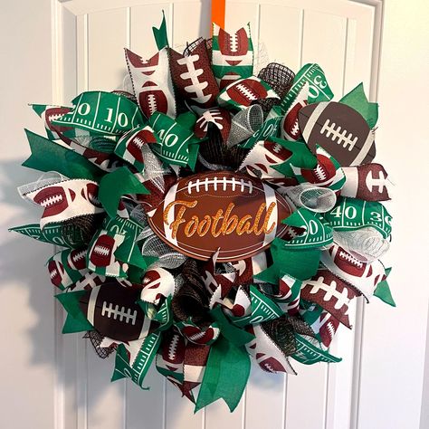 It’s Football Season!!! Show Ur Neighbors How Much You Like Football. Front Door Football Wreath Made With Mesh And Football Themed Ribbon. It’s Nice And Full. Measures About 22 Inches Across. Football Wreaths For Front Door, Football Wreath Diy, Football Wreaths, Spring Wreath For Front Door, Sports Wreaths, Football Wreath, Chiefs Football, Scentsy Bars, Seasonal Wreaths