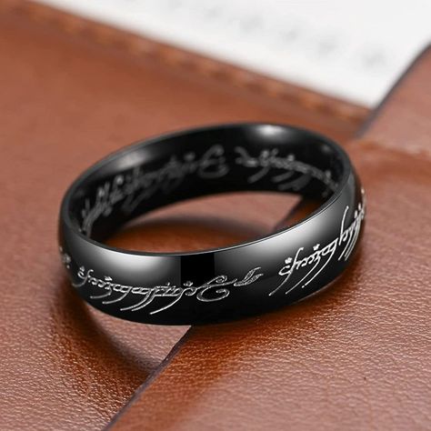 New! Hobbit Lord Of The Rings Black Elvish Rune Engraving Ring Details: - Condition: New - Color: Black - Material: Titanium Steel - Included: 1 X Ring Check Out My Other Listings! Other Items I Carry: Vintage Rings Retro Rings Men's Rings Sterling Silver Rings Engagement Bridal Wedding Rings Punk Biker Rings Ethnic Rings Floral Rings Pearl Rings Art Deco Rings Gothic Rings Couples Rings Ring Sets Heart Rings Funny Rings Silver Necklaces Gold Necklaces Vintage Necklaces And Earrings Handmade Jewelry Opal Rings Bracelets And Necklaces And Tons Of Popular Trendy Jewelry Deals. Lord Of The Rings Wedding Band, Goth Wedding Rings Men, Black Rings Men, Funny Rings, Ethnic Rings, Silver Rings Engagement, Rings Gothic, Retro Rings, Art Deco Rings