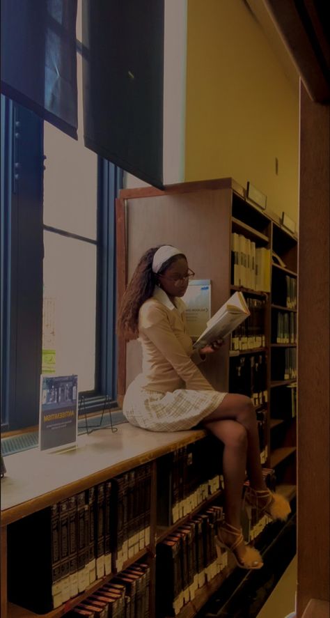 darkskin black woman reading in a library wearing a skirt, heels , and button up shirt Book Aesthetic Black Woman, Black Poet Aesthetic, Black Librarian Aesthetic, School Aesthetic Black Women, Black Church Girl Aesthetic, Black College Girl Aesthetic Studying, Black Author Aesthetic, Study Aesthetic Black Women, Black Writer Aesthetic