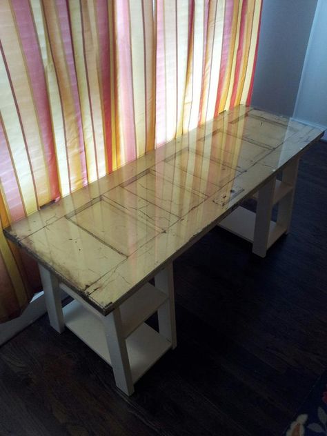 DIY desk my boyfriend and I made using an old door, 8 pieces of 2x4s, 4 planks of wood, and a sheet of glass custom-made to the door's dimensions. Desk Zen Garden, Mirror Repurpose, Door Desk, Doors Repurposed, Desk Ideas, Office Crafts, Craft Room Office, Old Door, Diy Desk