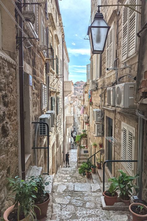 Wandering a quiet side alley in Dubrovnik, Croatia. I just loved the old stone, new technologies, and the person taking a break from the bustle of Old Town. For more on 23 hours in Dubrovnik and even more travel ispo, check out post on Wonder & Sundry. Dubrovnik Aesthetic, Deb Photos, Dubrovnik Croatia Photography, Dubrovnik Photo Spots, Dubrovnik Beach, Old Town Dubrovnik, Travelling Europe, Dubrovnik Old Town, Dubrovnik Croatia