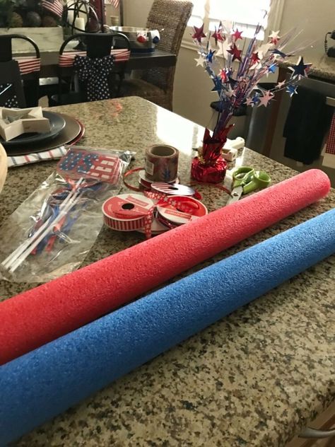 Last year I made some wooden firecrackers for July 4th, and this year I wanted to make something a bit different. I was at the Dollar Store and saw some pool noodles and came up with this idea. #diy #fourth of july #july #america #patriotic #diy decor Diy Dishwasher Tablets, Wooden Firecrackers, Golf Cart Decorations, Farmhouse Style Wreath, Crafty Decor, 4th July Crafts, Fourth Of July Decor, July Decor, Parade Float