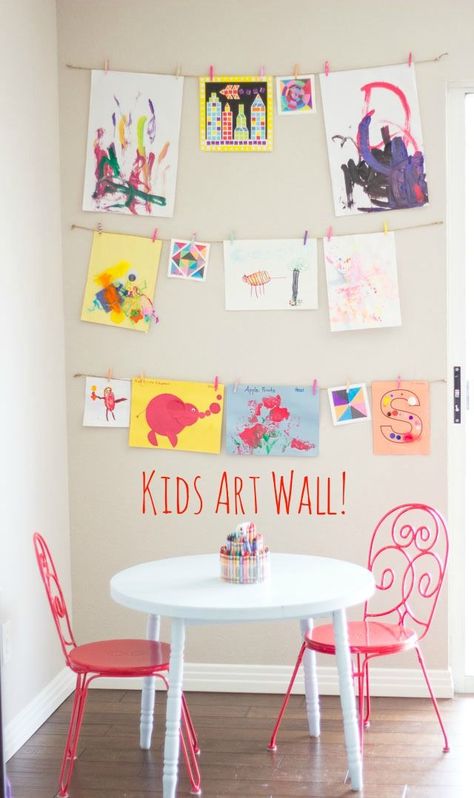 Creating a kids' art wall. This would be so adorable in a kids play room. Corner area where they can draw and painting all day. Then display their work for all to see. #kidsartdisplay #creativekids #kidsart Playroom Artwork Display, Display Kids Artwork In Bedroom, Wall Art Display For Kids, Diy Art Display Kids, Display For Kids Artwork, Kids Playroom Artwork, Kid Art Wall Display, Kid Artwork Display, Hanging Kids Art On The Wall