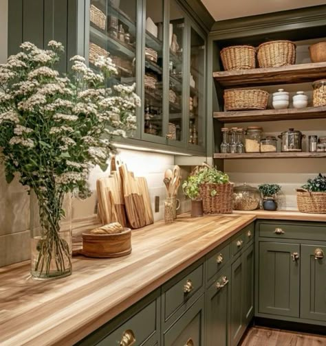 Hickory Cabinets Butcher Block Counter, Cottage Cabinets Kitchen, Sage Cabinets Kitchen Butcher Blocks, Green Kitchen With Butcher Block Counter, English Cottage Cabinets, Forest Aesthetic Kitchen, Kitchen Ideas Green And Wood, Sage Green Cabinets With Butcher Block, Green Kitchen With Butcher Block