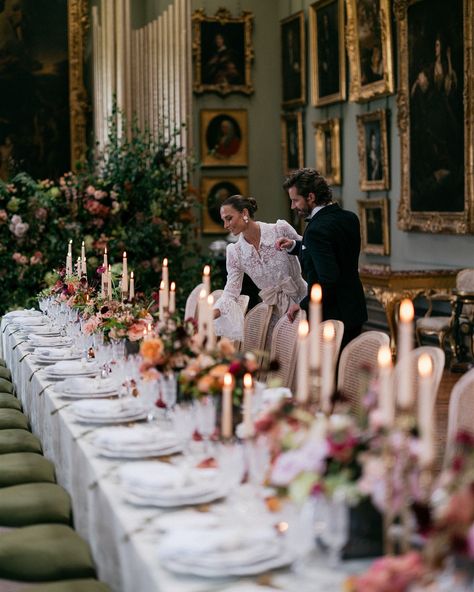 Sultry tones at the iconic Somerley House At the end of summer we visited the beautiful Somerley House in Hampshire to create a trilogy of immersive spaces. We filled the Picture Gallery with rich, sumptuous tones and candlelight to create a romantic and sultry wedding breakfast for guests to dine in. The floral installation created the backdrop to our scene and framed the divine portrait at the end of the hall. The installation was filled with fluffy hydrangea, endless roses and sunset co... Sultry Wedding, Somerley House, August Weddings, Floral Installation, Keys Wedding, August Wedding, Organic Wedding, Dine In, Wedding Breakfast