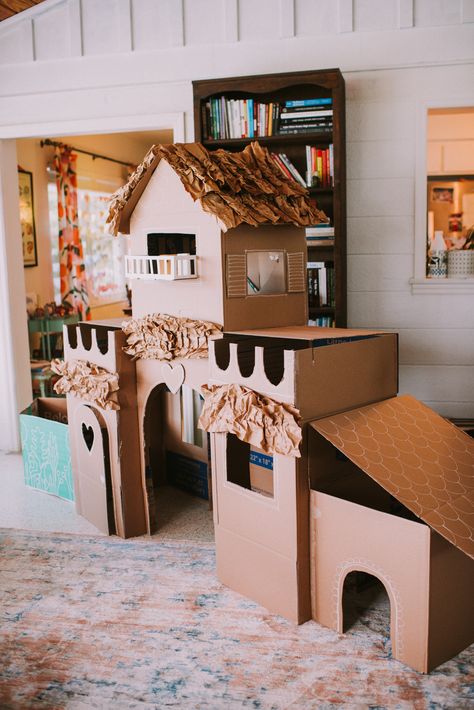 Creating a Cozy Cardboard Castle - Casey Wiegand of The Wiegands | Get ready to impress your kids with this pretty epic rainy day project! Even my five year old proclaimed me “the best builder in the world” mid-way through construction, and our cozy abode is still going strong after a few days of play! Cardboard Cat House Template, Cardboard Castle For Cats, Five Year Old Crafts, Cat Box Ideas Cardboard Play Houses, Cardboard Box Cat House, Cat Castle Diy Cardboard Boxes, Cardboard Cat Castle, Cardboard Castles, Diy Cat House Cardboard