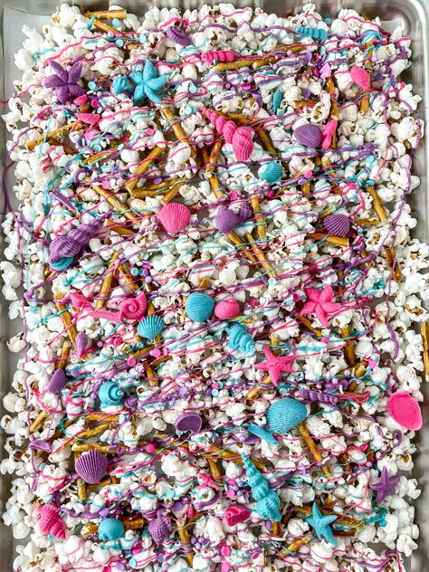 Mermaid Party Food Ideas Snacks, Mermaid Movie Night, Mermaid Birthday Snack Ideas, Mermaid Rice Krispie Treats, Mermaid Party Treats, Mermaid Snacks, Mermaid Popcorn, Mermaid Popcorn Recipe, Dipped Rice Krispie Treats Mermaid