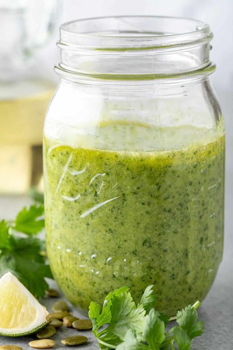 This pumpkin seed Cilantro Pesto sauce recipe is made with fresh cilantro, Parmesan cheese, extra-virgin olive oil, garlic and pepitas. Kamado Grill Recipes, Cilantro Garlic Sauce, Pesto Sauce Recipe, Pesto Potatoes, Cilantro Pesto, Delicious Salad Dressings, Arugula Pesto, Olive Oil Garlic, Kamado Grill