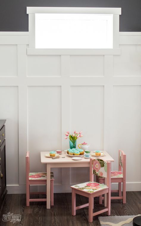 DIY Board & Batten Fireplace Wall and Kids Table Makeover -- I love how adorable this is! The floral print is such a cute touch for a kids craft table. Attic Bunkroom, Batten Fireplace Wall, Fireplace Wall Makeover, Childs Table And Chairs, Paint Kids Table, Child Table And Chairs, Table For Kids Doll House, Kids Craft Tables, Diy Kids Table