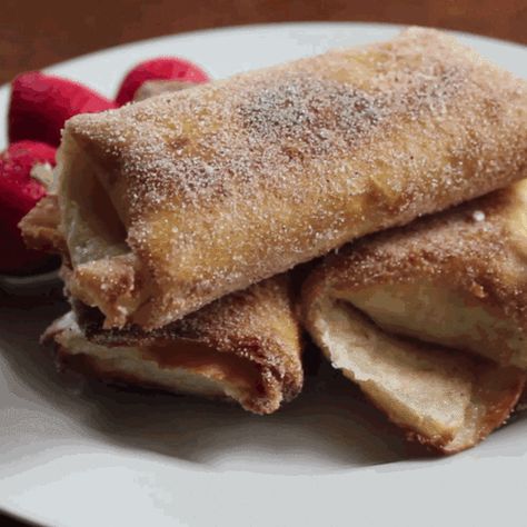 Banana Churro Tortilla Pockets Are the Epitome of Dessert Tortilla Deserts Roll Ups, Dessert Using Tortillas, Mexican Banana Dessert, Banana Tortilla Wrap, Churro Tortilla, Tortilla Desserts, Banana Churros, Tortilla Pockets, Fried Desserts