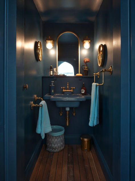 35 Gorgeous Small Bathroom Ideas Petrol Blue Bathroom, Navy Blue Water Closet, Ink Blue Bathroom, Dark Blue Downstairs Toilet, Monochromatic Blue Bathroom, Powder Blue Powder Room, Indigo Bathroom Ideas, Blue Brass Bathroom, Dark Teal Powder Room