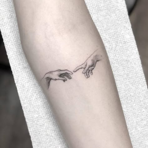 Hands Almost Touching Tattoo, Two Fingers Touching Tattoo, Creation Of Adam Hands, Evolution Tattoo, Bird Tattoo Wrist, Lion Head Tattoos, Statue Tattoo, Mommy Tattoos, Bone Tattoos