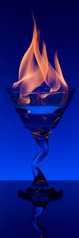 A delicious recipe for Flaming Blue, with anisette, vermouth and Bacardireg; 151 rum. Flaming Cocktails, Flaming Drinks, After Dinner Drinks, Light My Fire, Bacardi, Foto Art, Feeling Blue, Love Blue, Fire And Ice