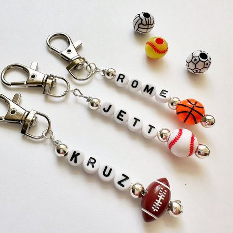 BOYS - sports personalized keychains Choose: football, baseball, basketball, soccer, volleyball, softball Handmade Softball Keychain Diy Team Gifts, Boy Keychains, Beads Artwork, Keychain For Boys, Sports Keychains, Softball Keychain, Softball Bag Tags, Diy Souvenirs, Basketball Keychain