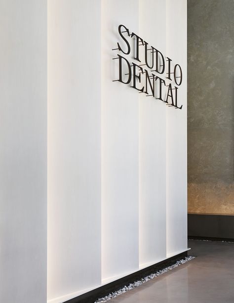 Studio Dental II | Montalba Architects, Inc. | Media - Photos and Videos - 7 | Archello Best Dental Clinic Design, Office Logo Wall, Minimal Ceiling Design, Logo Wall Design, Montalba Architects, Dentist Office Design, Dental Logo Design, Feature Wall Design, Corporate Interior Design